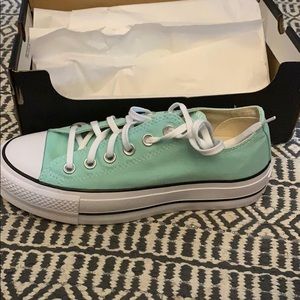 Brand new, never worn teal converse